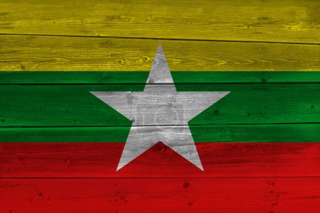 Foto de Bandera de myanmar con textura de madera en su fondo - Imagen libre de derechos