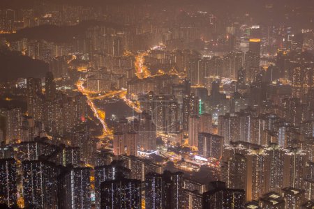Photo for Residential Buildings in Hong Kong at Night. Panoramic Aerial View - Royalty Free Image