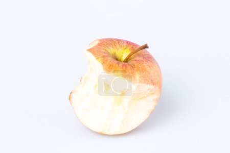 Photo for Bitten apple over white background - Royalty Free Image