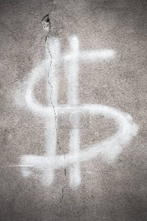Photo for Cracked dollar sign on wall - Royalty Free Image