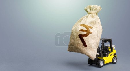 Photo for Forklift carrying a indian rupee money bag. Strongest financial assistance, business support. Borrowing on capital market. Stimulating economy. Subsidies soft loans. Investments. Anti-crisis budget. - Royalty Free Image