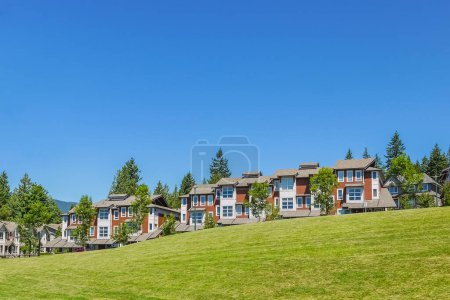 Photo for Row of new townhouses with recreation area across the road - Royalty Free Image