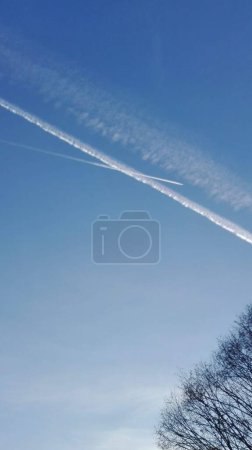 Photo for Condensate strips in the afternoon - Royalty Free Image