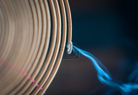 Photo for Burning spiral incense stick in temple. - Royalty Free Image