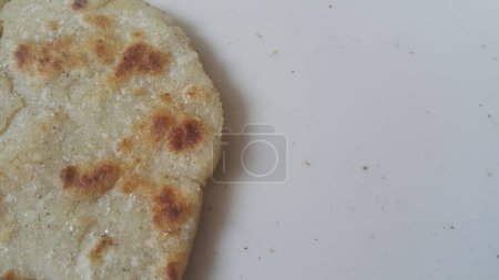 Photo for Closeup view of of traditional home made bread called Jawar roti or bhakri - Royalty Free Image