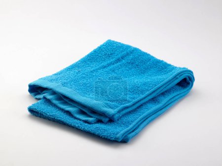 Photo for Blue towel isolated on white background - Royalty Free Image