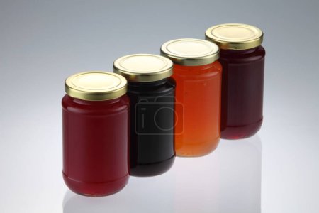 Photo for Group of jam on grey background - Royalty Free Image