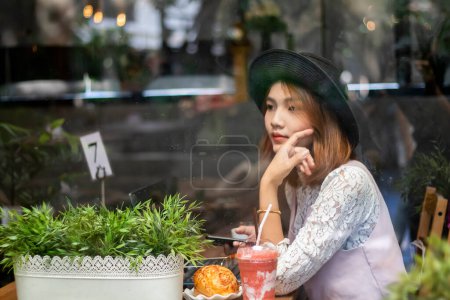 Photo for Portrait asian woman in cafe - Royalty Free Image