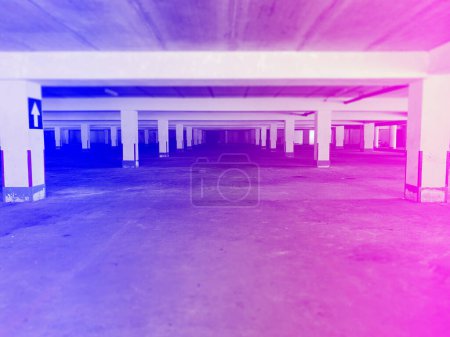 Photo for Neon light and empty parking garage in a modern building, retro style - Royalty Free Image