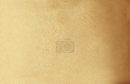 Foto de Pergamino amarillo-marrón dañado con puntos blancos en la superficie. Textura o fondo - Imagen libre de derechos