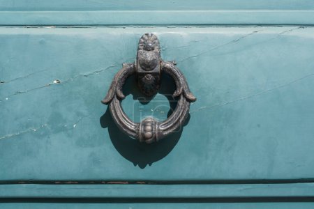 Photo for Vintage image of ancient door knocker on a wooden door. - Royalty Free Image