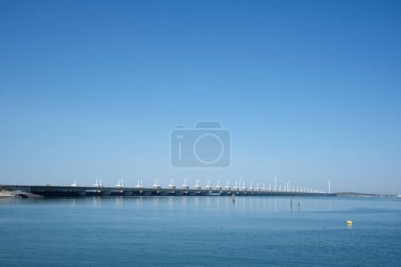 Photo for The zeelandbrug deltaworks in holland at the Oosterschelde river to protect holland form high sea level, this is near the dutch museum neeltje jans - Royalty Free Image