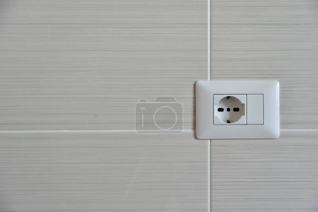 Photo for White Socket on White Wall in the House - Royalty Free Image