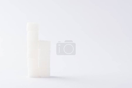 Photo for Ascending stacks of sugar cubes graph chart - Royalty Free Image