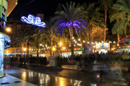 Photo for "Beautiful streets of Elche decorated with Christmas motifs and lighting" - Royalty Free Image