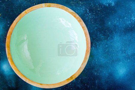 Photo for One bowl on the blue background - Royalty Free Image