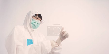 Photo for Asia woman doctor in PPE suit or Personal Protective Equipment - Royalty Free Image
