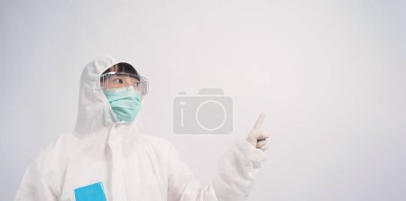 Photo for Asian woman doctor in PPE suit or Personal Protective Equipment - Royalty Free Image