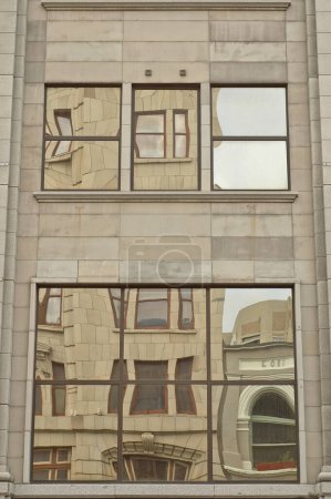 Photo for Heritage building reflection on window - Royalty Free Image