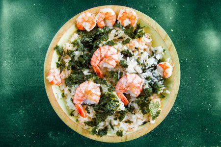 Photo for Rise with shrimps and Nori , delishes meal in the plate on the background, studio shot - Royalty Free Image