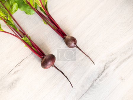 Photo for Fresh beautiful washed beets on a light background - Royalty Free Image