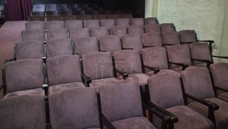 Photo for Classic purple theater seats in many rows - Royalty Free Image