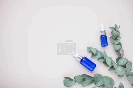 Photo for Bottles with face serum on a light background. Beauty industry. - Royalty Free Image