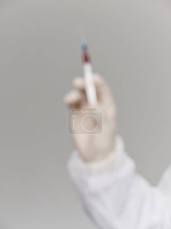 Photo for "Medical glove hand grafting vaccine health covid-19 research laboratory" - Royalty Free Image