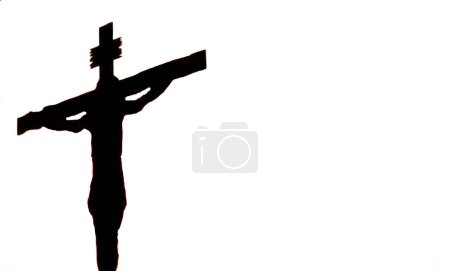 Foto de Silueta de Jesús crucificado sobre un fondo blanco - Imagen libre de derechos