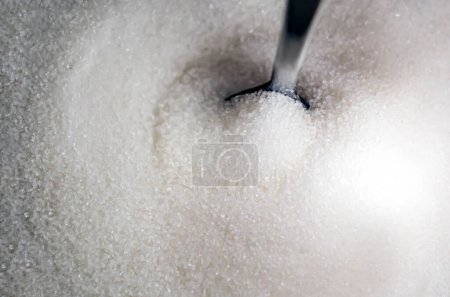 Foto de Una cucharadita bañada en azúcar blanca - Imagen libre de derechos