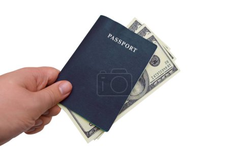 Téléchargez les photos : Passeport et argent entre les mains d'un homme sur fond blanc. L'homme donne un pot-de-vin en mettant de l'argent dans son passeport - en image libre de droit