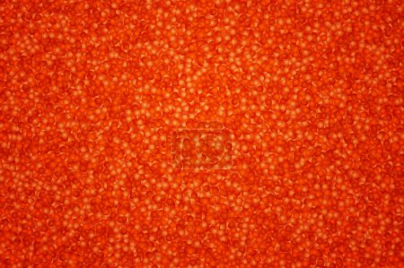 Téléchargez les photos : Fond coloré avec du caviar rouge réaliste - en image libre de droit