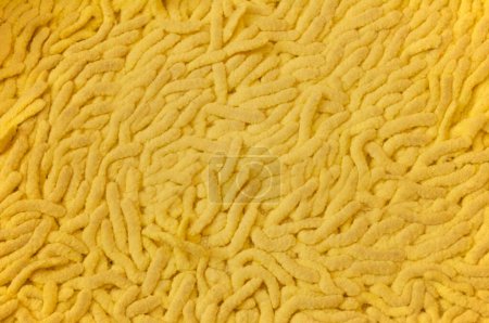 Photo for Large yellow texture Mat for the bathroom - Royalty Free Image