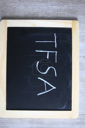 Photo for Tfsa wrote on a chalk board. TFSA is a canadian savings scheme - Royalty Free Image