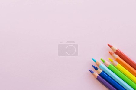 Photo for "Color pencils on Pink background, copy space. Office supplies, back to school." - Royalty Free Image