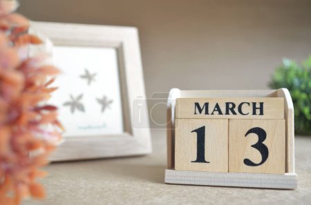 Photo for Wooden calendar with month of March, planning concept - Royalty Free Image
