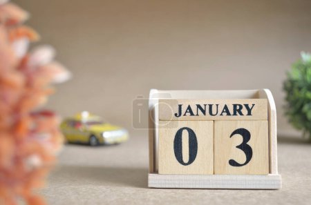 Photo for "close-up shot of wooden blocks calendar with January 3." - Royalty Free Image