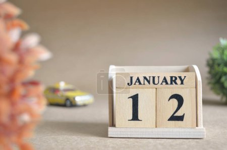 Photo for "close-up shot of wooden blocks calendar with January 12." - Royalty Free Image
