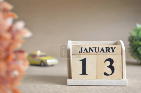 Photo for "close-up shot of wooden blocks calendar with January 13." - Royalty Free Image