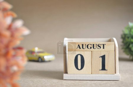 Photo for "close-up shot of wooden blocks calendar with August 1." - Royalty Free Image