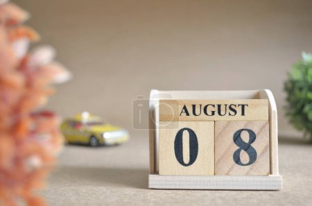 Photo for "close-up shot of wooden blocks calendar with August 8." - Royalty Free Image