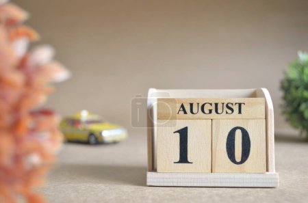 Photo for "close-up shot of wooden blocks calendar with August 10." - Royalty Free Image