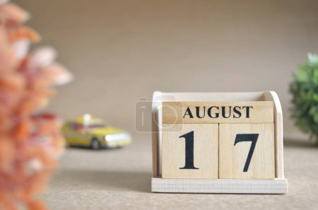 Photo for "close-up shot of wooden blocks calendar with August 17." - Royalty Free Image