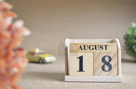 Photo for "close-up shot of wooden blocks calendar with August 18." - Royalty Free Image