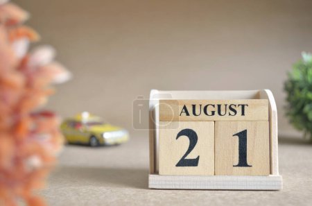 Photo for "close-up shot of wooden blocks calendar with August 21." - Royalty Free Image