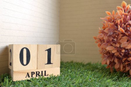 Photo for Wooden calendar with April month, planning concept - Royalty Free Image