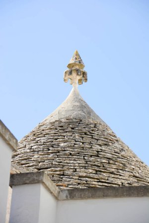 Photo for Trulli symbols of the building on blue sky background - Royalty Free Image