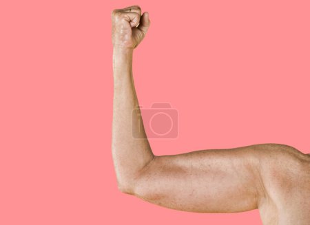 Photo for Woman flexing her muscles - Royalty Free Image
