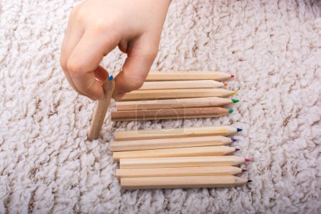 Photo for "Hand holding colored pencils for creative idea and concept. " - Royalty Free Image