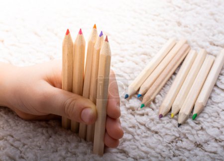 Photo for "Hand holding colored pencils for creative idea and concept. " - Royalty Free Image